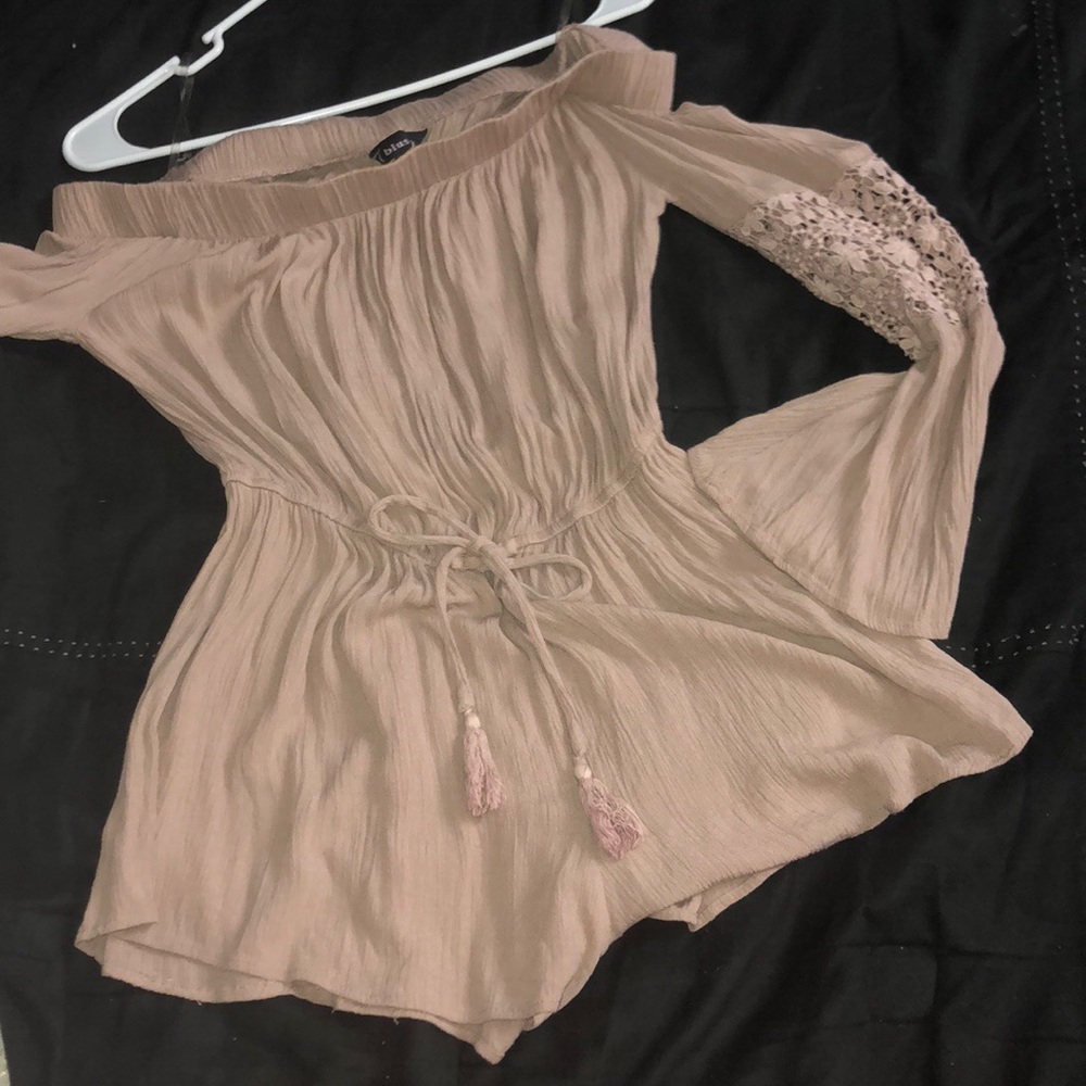 Rose/Blush off the shoulder Romper.